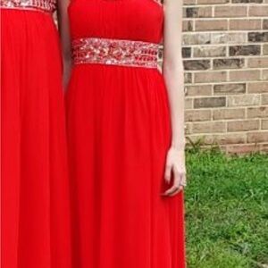 Elegant Red Gown with Embellished Waist